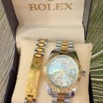 Gold and silver men's watch and bracelet