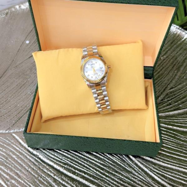 Women Rolex Watch (gold and silver colour)